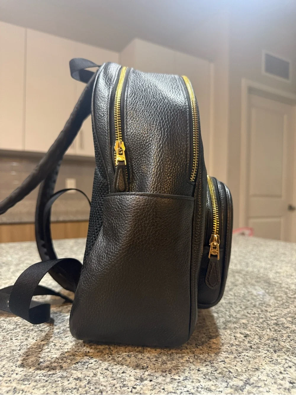 Coach compact pebbled